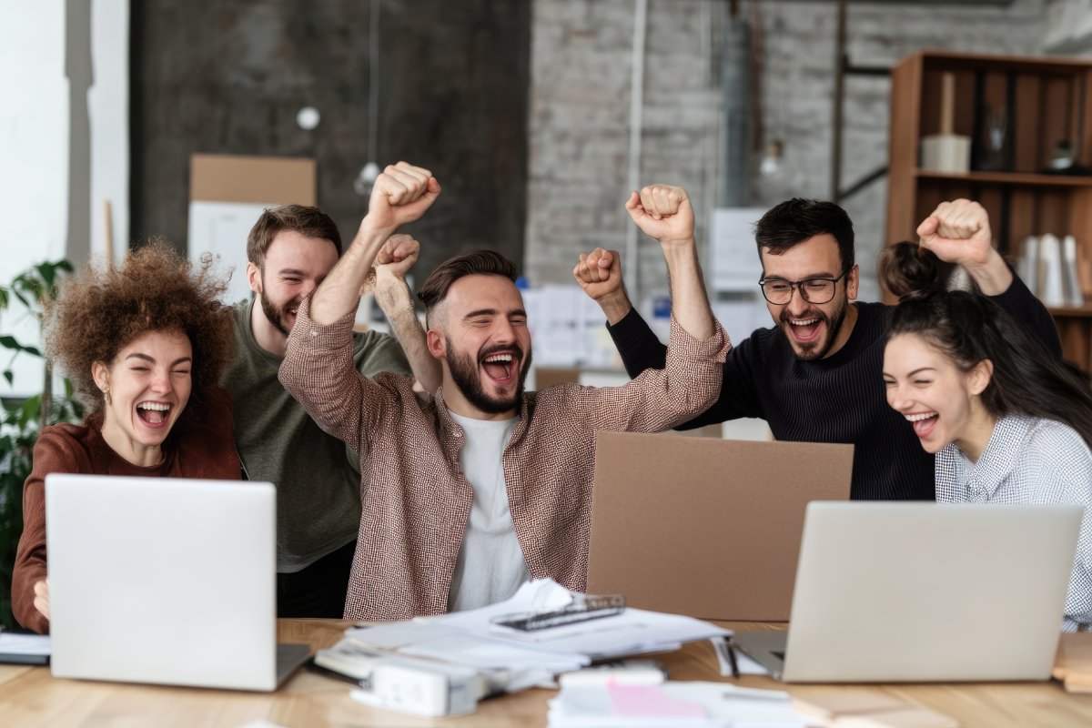 L and D team celebrating after successfully defending training budget with data