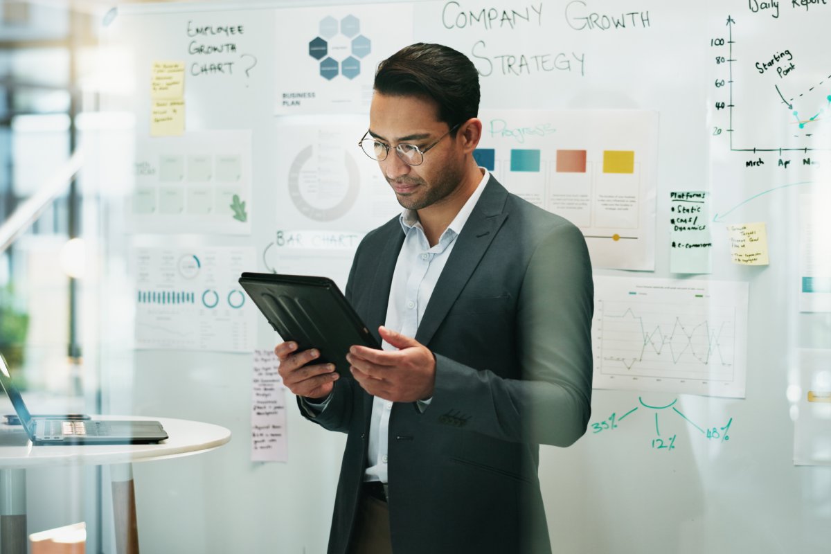 Training consultant reviewing growing recurring revenue from strategic partnerships